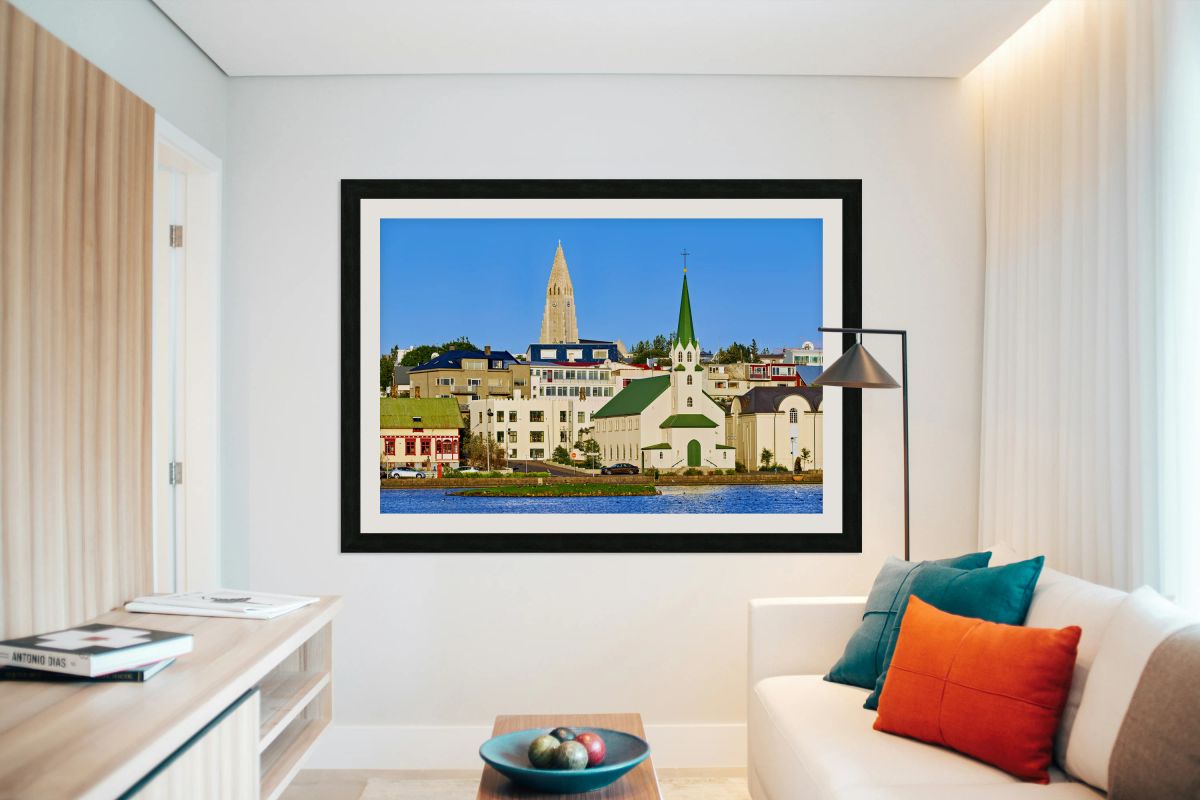 Lutheran free church and Halgrimskirkja near Tjornin lake