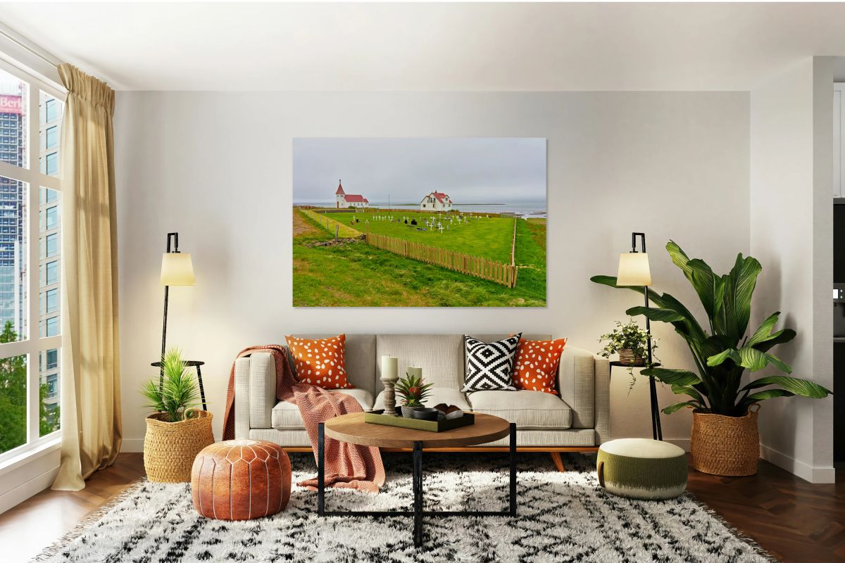 Prestbakkakirkja church and graveyard in Iceland by the sea