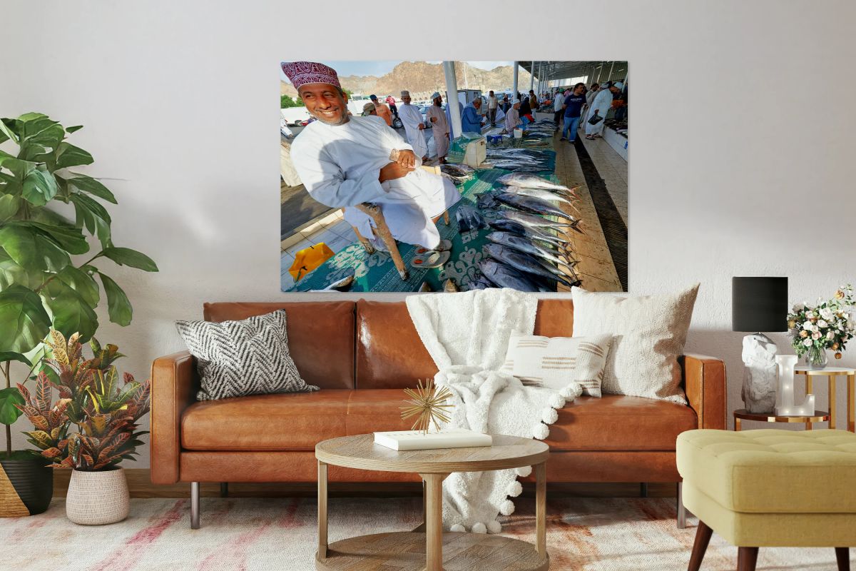 Fish market in Muscat Oman with vendor selling fish