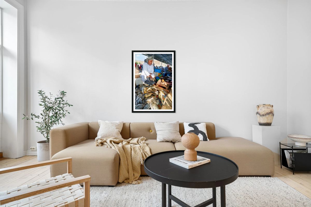 Fish sellers at Muscat Oman market display fresh catch