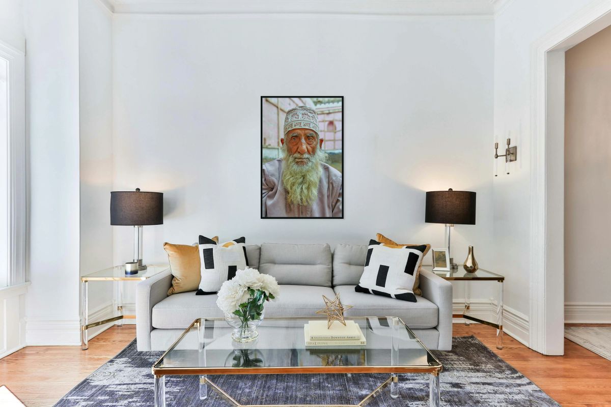 Senior man with white beard in Muscat Oman courtyard