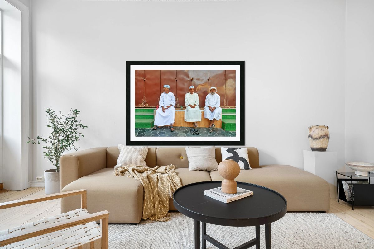 Local men relax on a bench in Muscat Oman during the afternoon