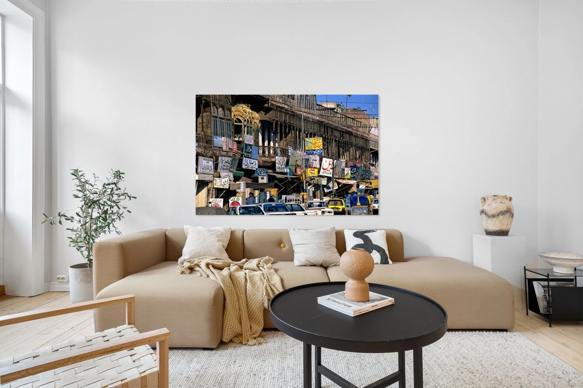 Streets in Peshawar with shops and vehicles