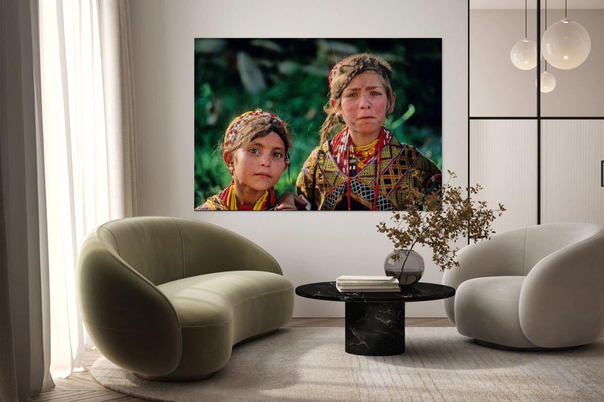 Children of Pakistan wear traditional clothing in the sunlight