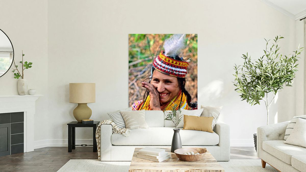 Kalash woman smiles at a cultural event in Pakistan