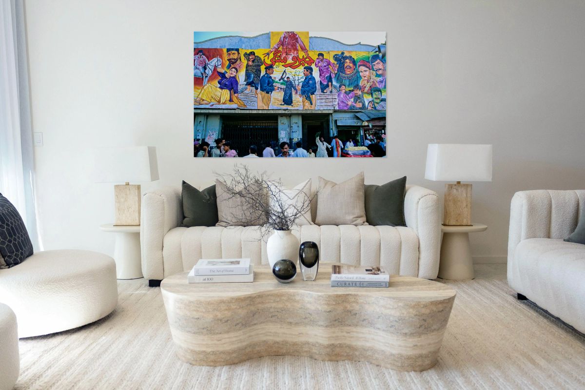 Wall art outside cinema in Lahore showing local culture and life