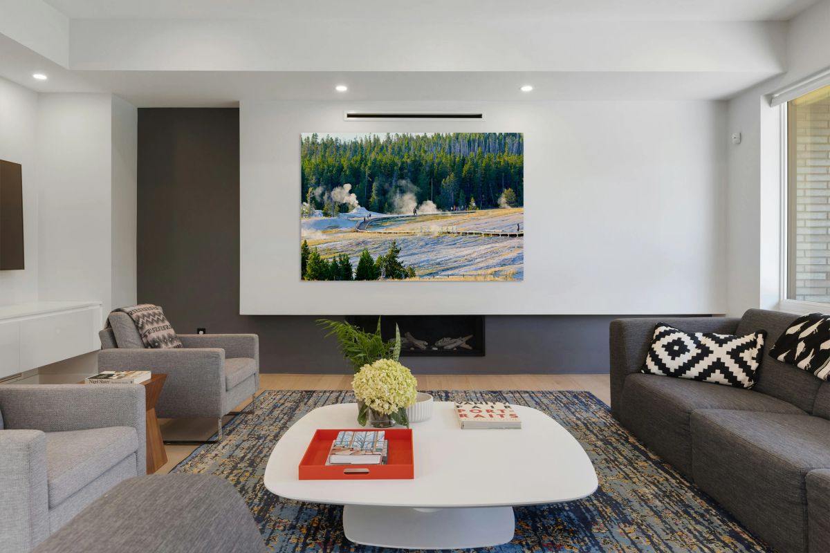 People explore the boardwalks in Upper Geyser Basin