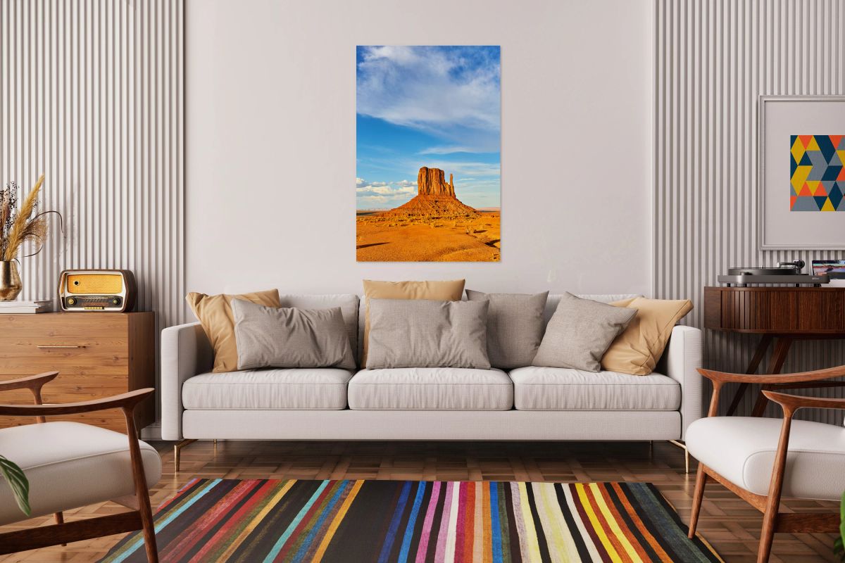 Monument Valley shows red rock formations under blue sky