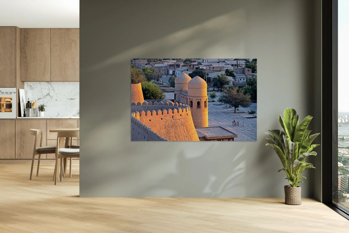 View of Khiva in Uzbekistan with historic buildings and people