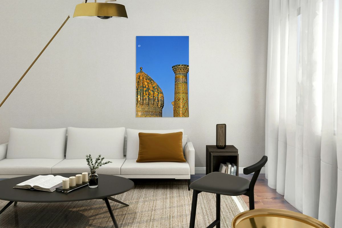 Madrasa in Samarkand shows dome and column under the moon