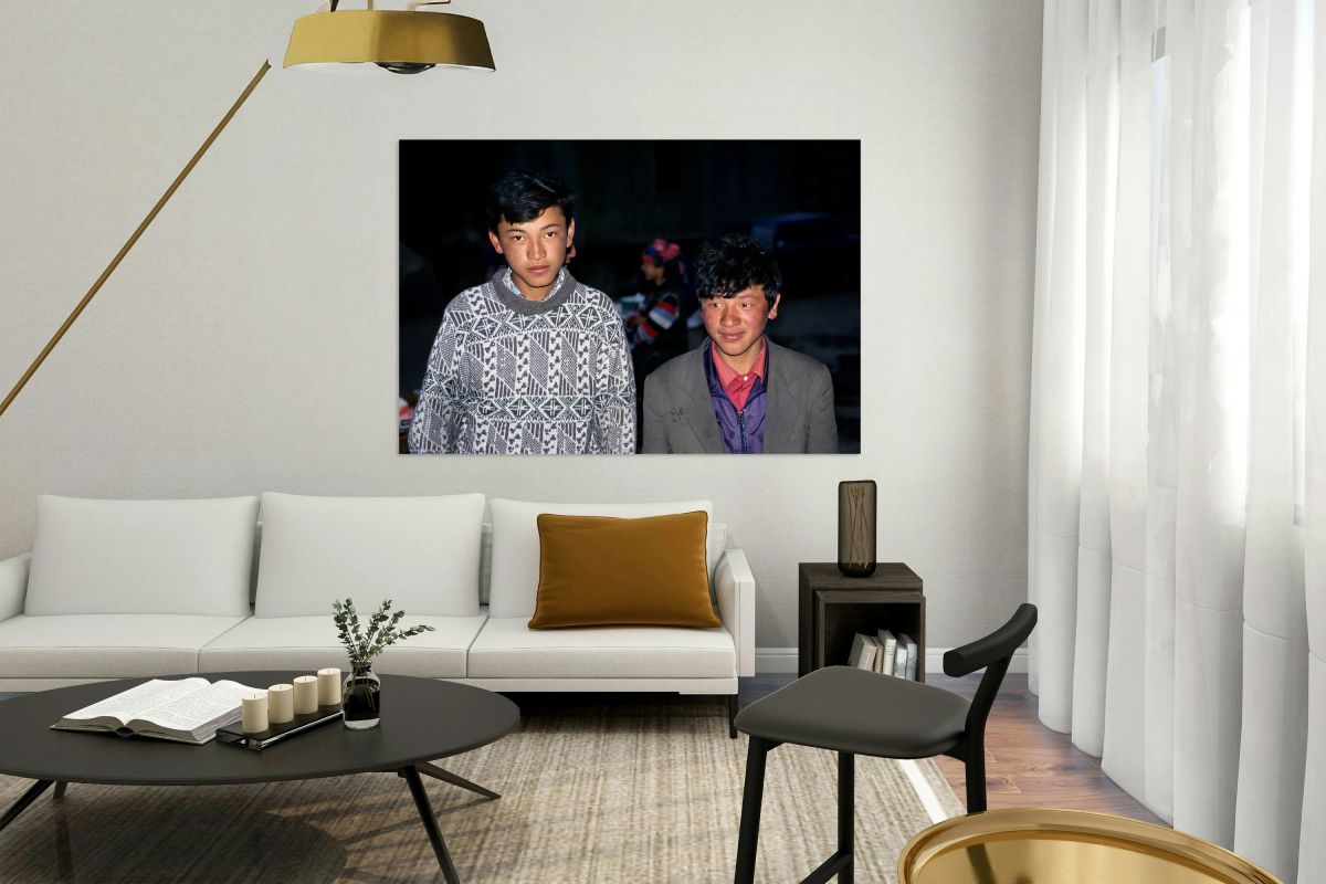 Boys stand together in Uzbekistan at night during a local event