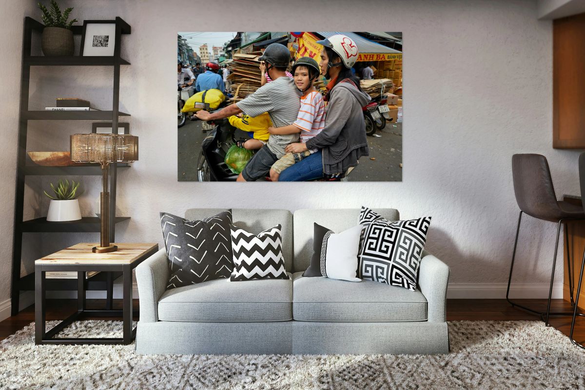 Traffic in Ho Chi Minh City with a family on a motorbike