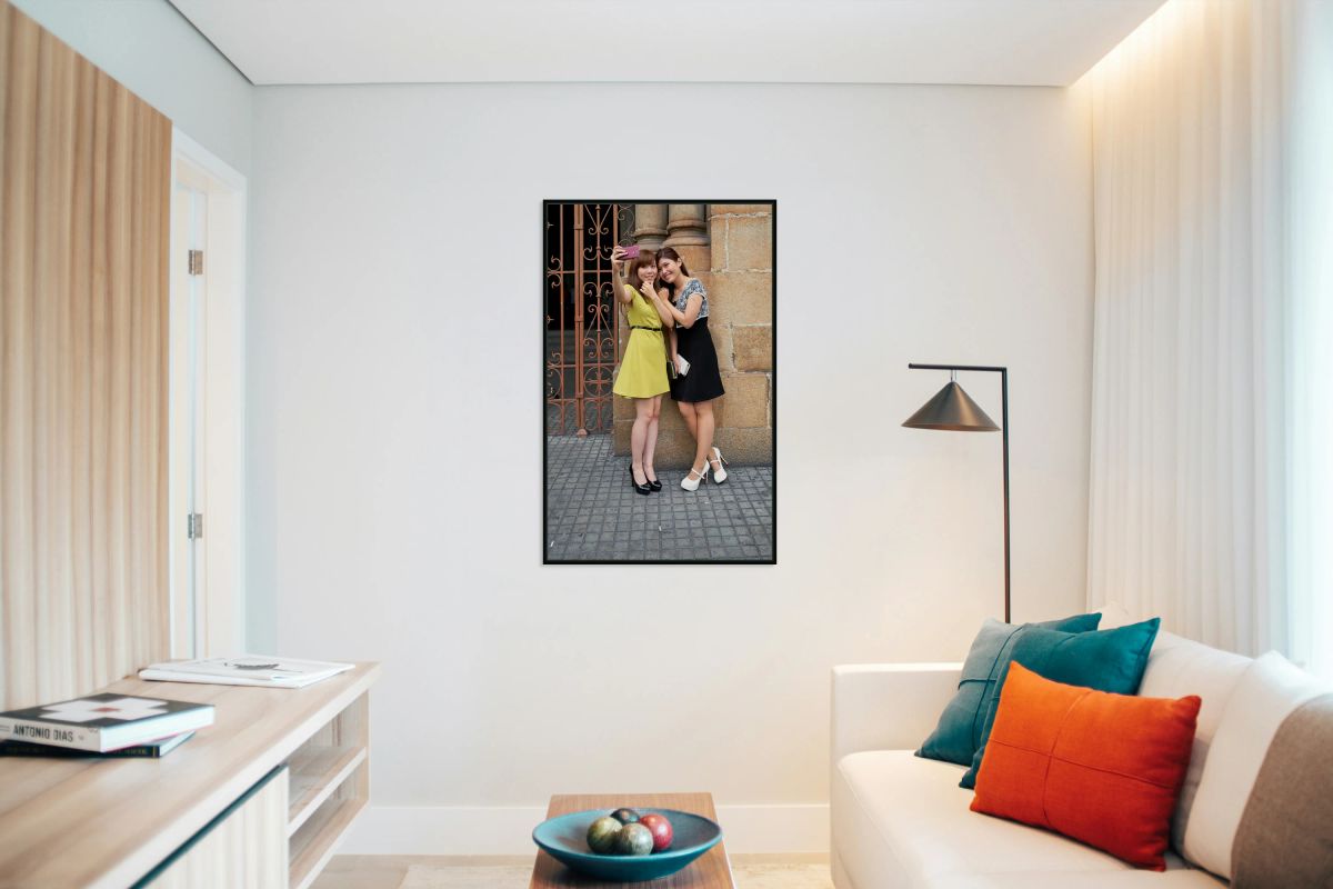 Two women take a selfie in Ho Chi Minh City