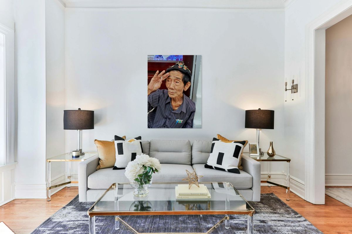 Old man salutes in Ho Chi Minh City streets