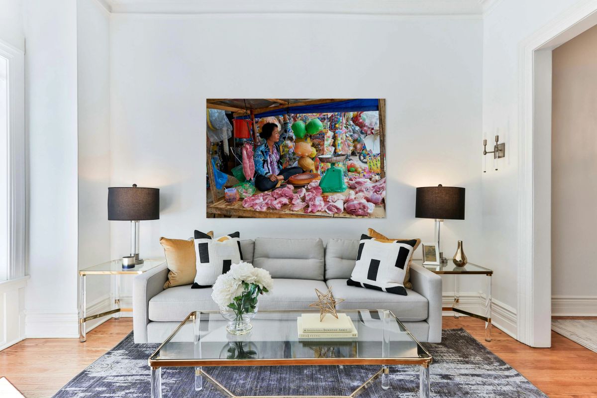 Market scene in Phu Quoc with seller and meat display