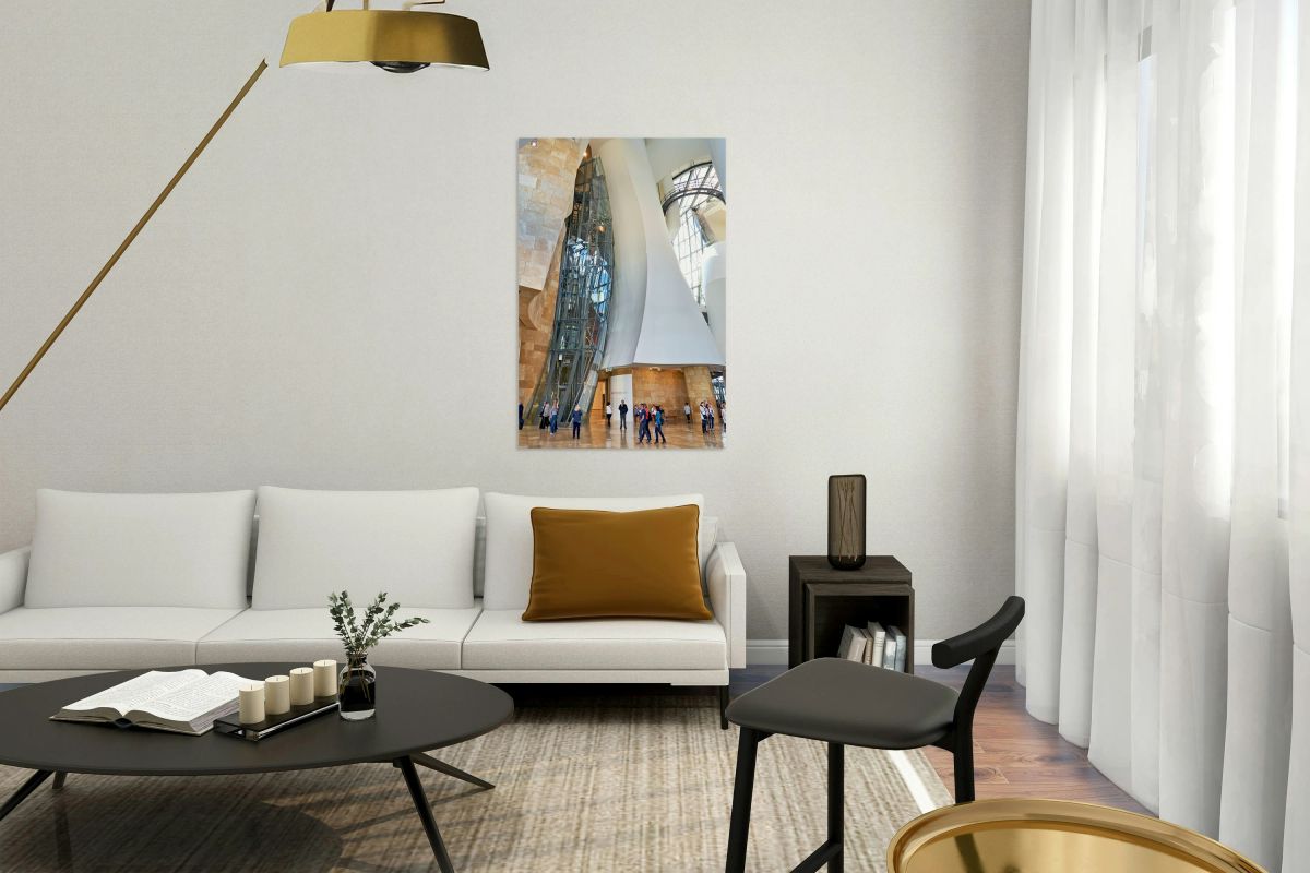 Visitors explore the interior of the Guggenheim Museum in Bilbao