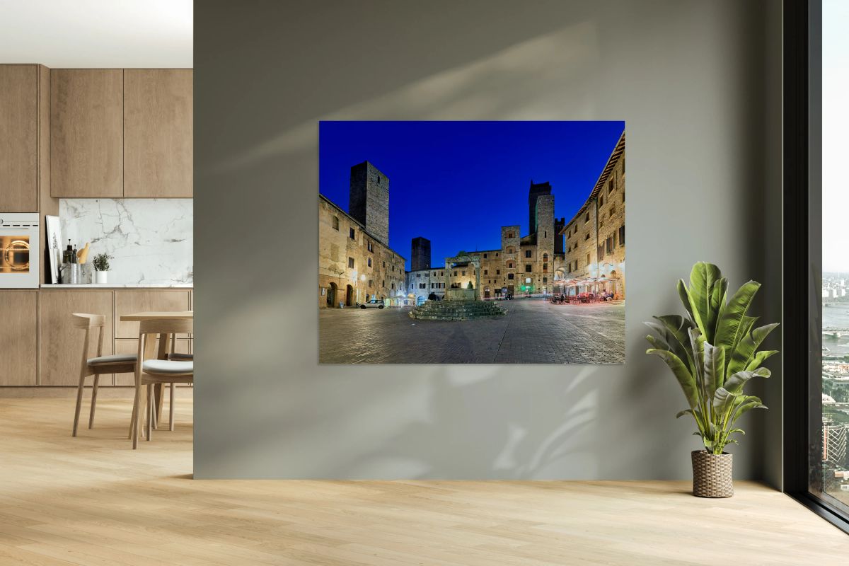 Sunset view of Piazza della Cisterna in San Gimignano Italy