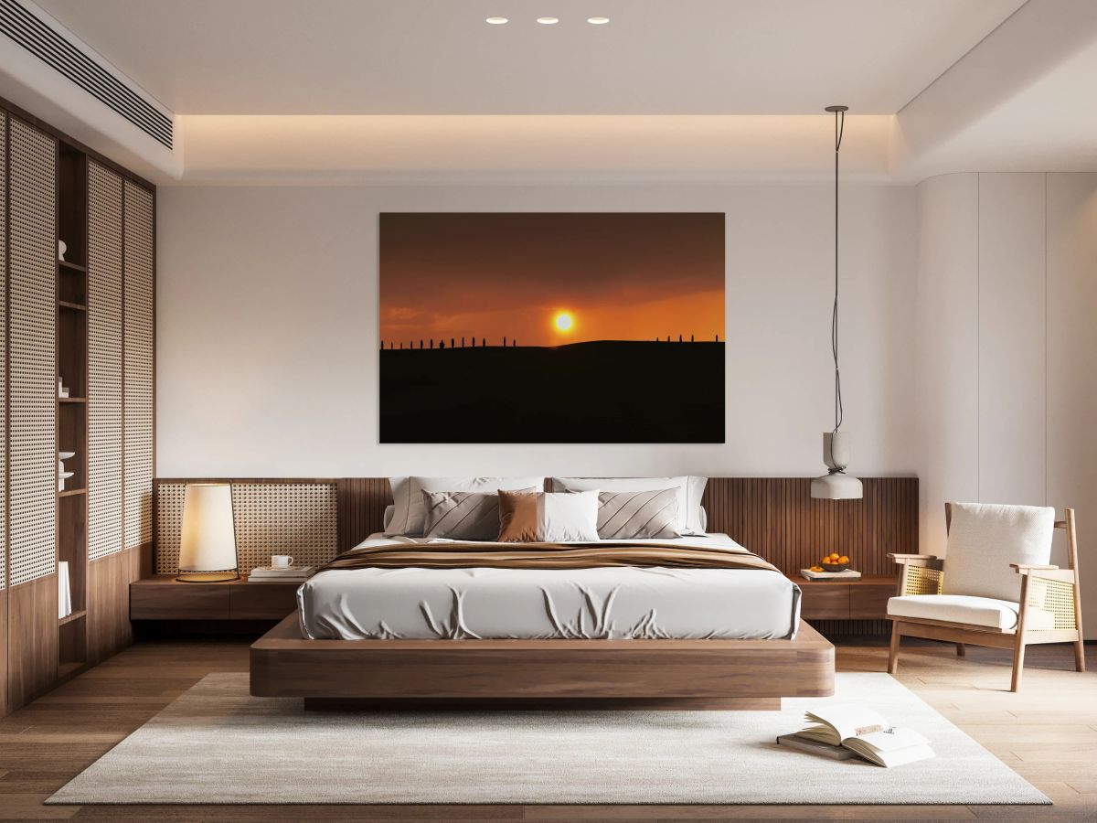 Sunset over cypress trees in Val dOrcia Tuscany Italy