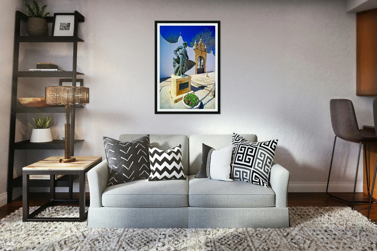 Bullring entrance in Ronda with statue of matador