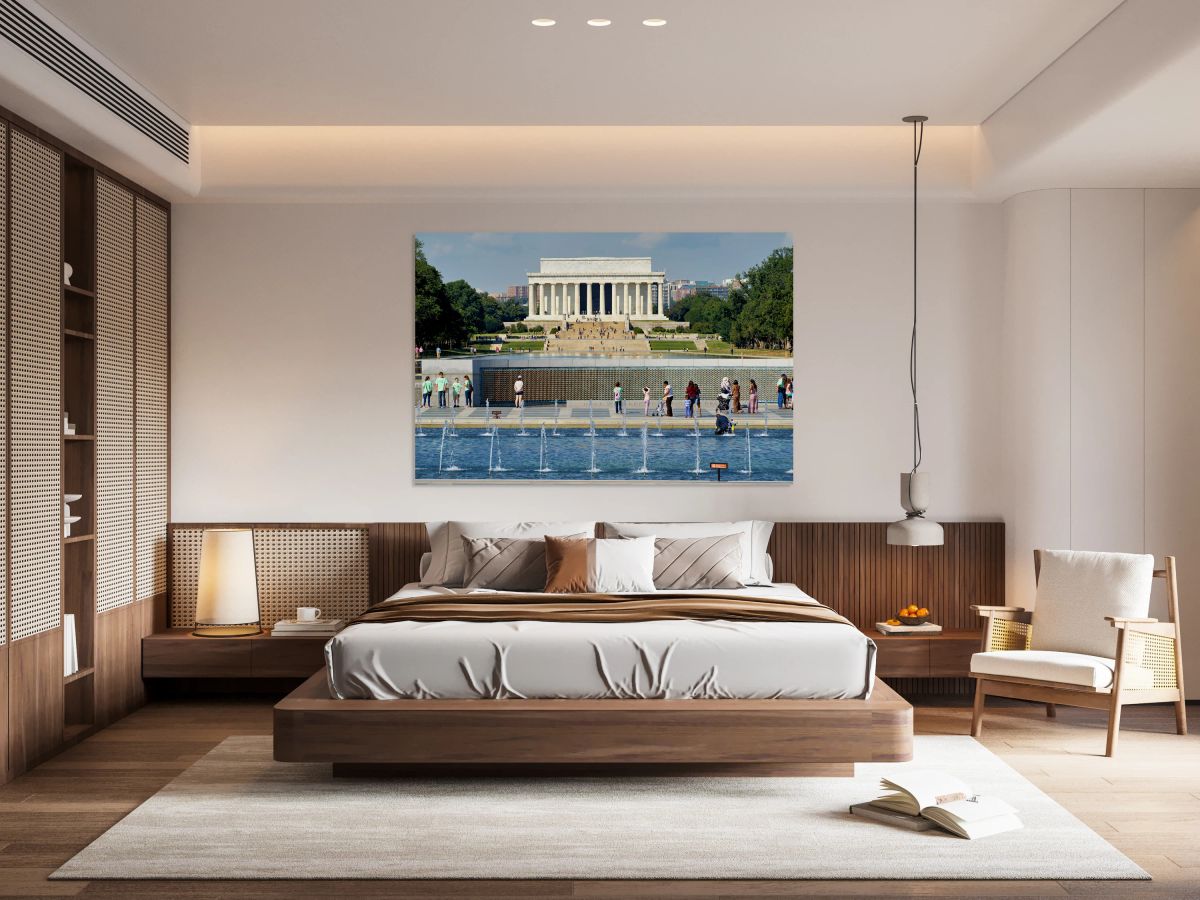 Visitors walk around the National World War II Memorial