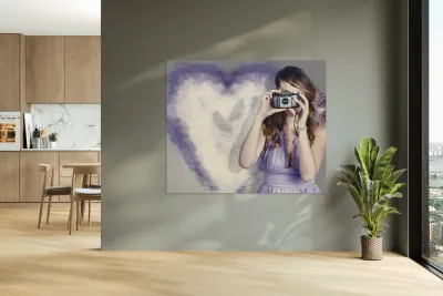 Woman with camera. Love in a still frame capture Reproduction