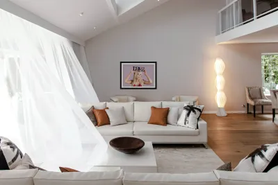 Woman holding love sign Reproduction