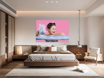 Smiling housewife doing housework laundry duties Reproduction