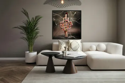 Woman dancing in colorful floral dress outdoor Reproduction