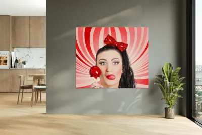 Happy young retro woman with lollipop toffee apple Reproduction