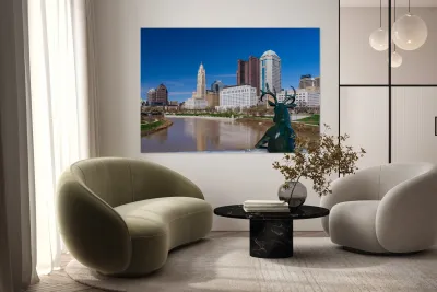 Scioto Lounge statue by waterfront looking at Columbus skyline Reproduction