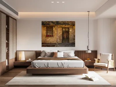 Rustic San Juan building with a barred window red flowers and a Reproduction