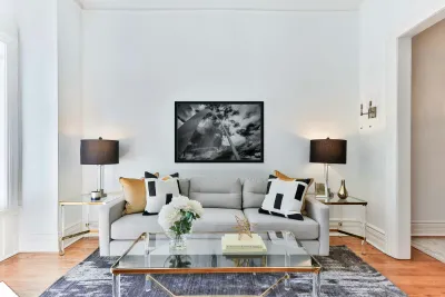 Sculpted Arch Amidst Dynamic Clouds Reproduction