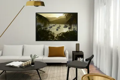 Catamarans and sailboats at the anchorage at Pussers Marina Cay Reproduction