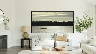 Backlit small boat coming into Tofino Reproduction