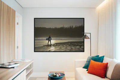 Women walking with a surfboard on Long Beach Pacific Rim National Park Reproduction