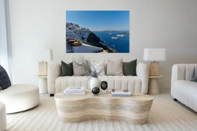 Santorinis white village blue caldera and cruise ships. Reproduction