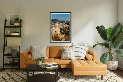 Iconic Santorini village and church overlooking caldera. Reproduction