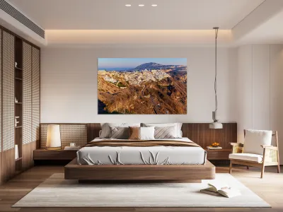 Santorinis Fira town on caldera cliff at sunset. Reproduction