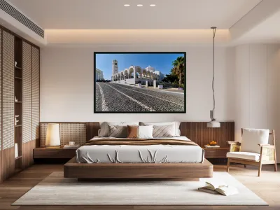 Beautiful white church and cobblestone street in sunny Santorini Reproduction