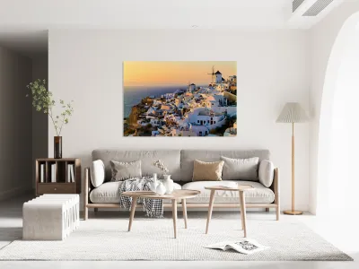 Santorini village at sunset with windmills overlooking the Aegea Reproduction