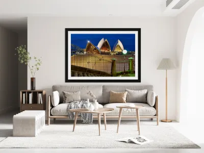 Sydney Opera House illuminated at dusk with crowds on steps. Reproduction