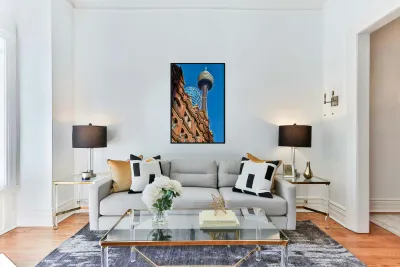 Sydney Tower and J.P. Morgan building against blue sky. Reproduction