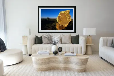 Carved stone monument in the Australian outback at sunset. Reproduction