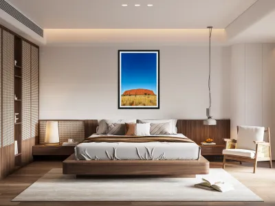 Uluru monolith under a clear blue sky. Reproduction