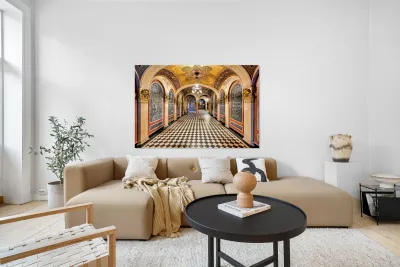 Historic church corridor with ornate arches and checkered floor. Reproduction
