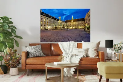 Hofburg Palace square at night with illuminated buildings and st Reproduction