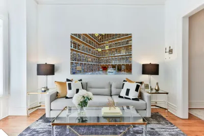 People explore the National Library in Athens Greece Reproduction