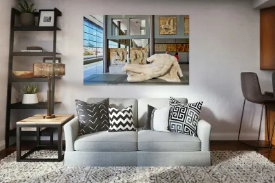 Visitors explore sculptures at Acropolis Museum in Athens Greece Reproduction