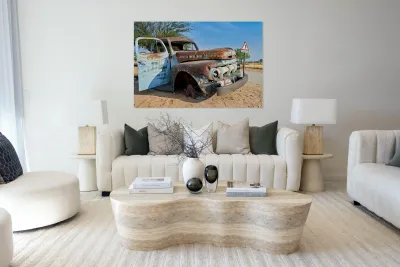 Classic car wreck in Namibias desert environment Reproduction