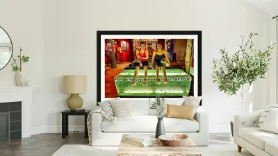 Smiling women enjoy fish foot spa. Reproduction